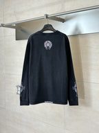 Dark long-sleeve T-shirt, back view, round crest print and sleeve graphics