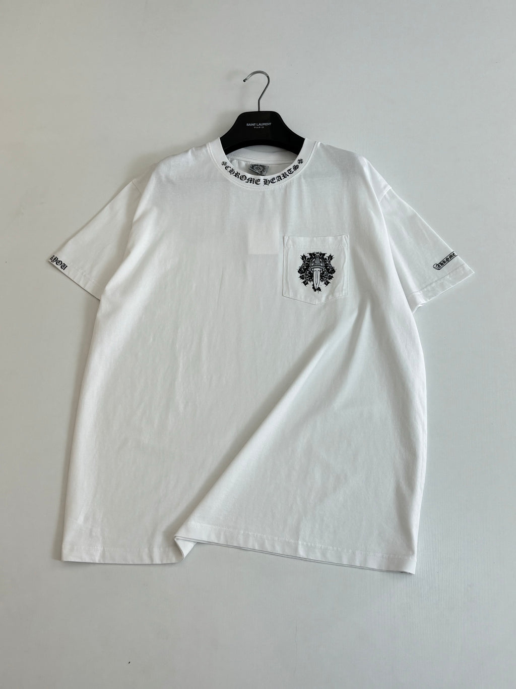 White short-sleeve T-shirt with front crest patch and sleeve logo
