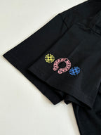 Black short-sleeve T-shirt with small multicolor emblem on sleeve hem