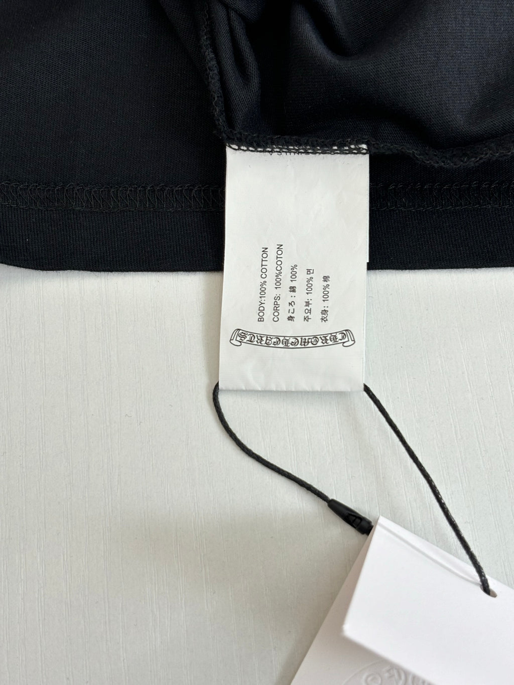 Black short pants with hanging size label