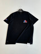 Black short-sleeve T-shirt with chest graphic and small sleeve emblem