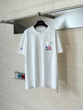 White T-shirt with small chest logo and colorful sleeve patch