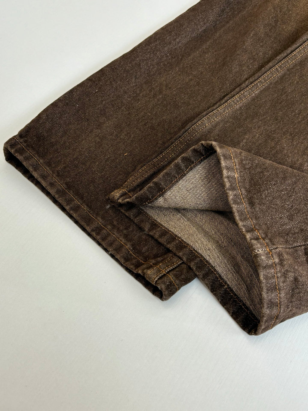 Louis Vuitton brown denim pants hem with stitched cuff detail