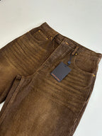 Louis Vuitton brown denim pants detail, button placket and stitched waistband
