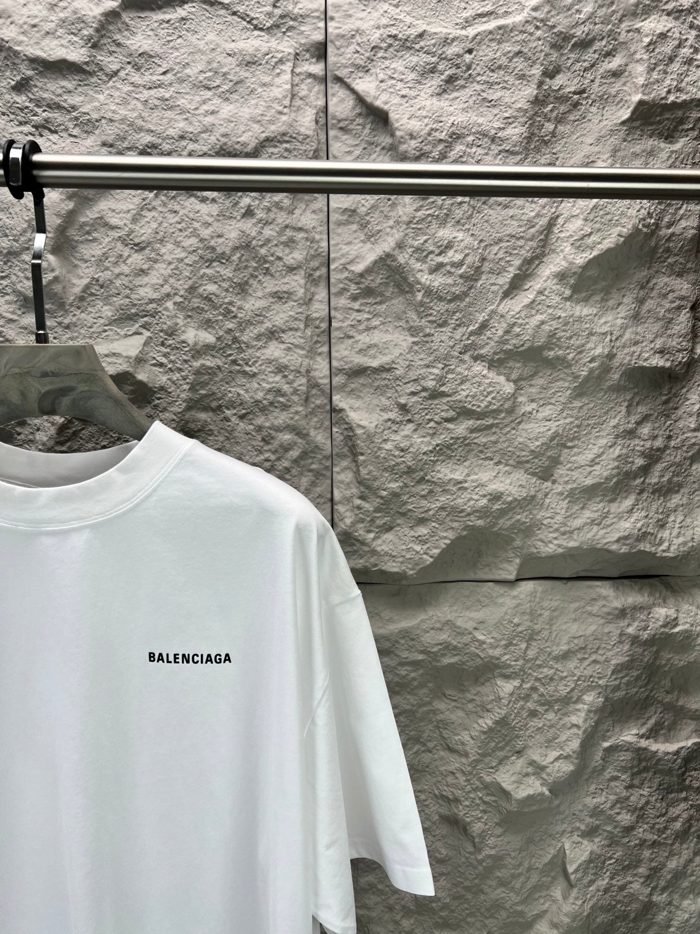 Balenciaga white T-shirt with small BALENCIAGA logo on sleeve