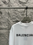Balenciaga white backless T-shirt with large BALENCIAGA lettering