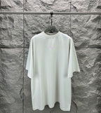 Balenciaga white T-shirt with small pink chest logo