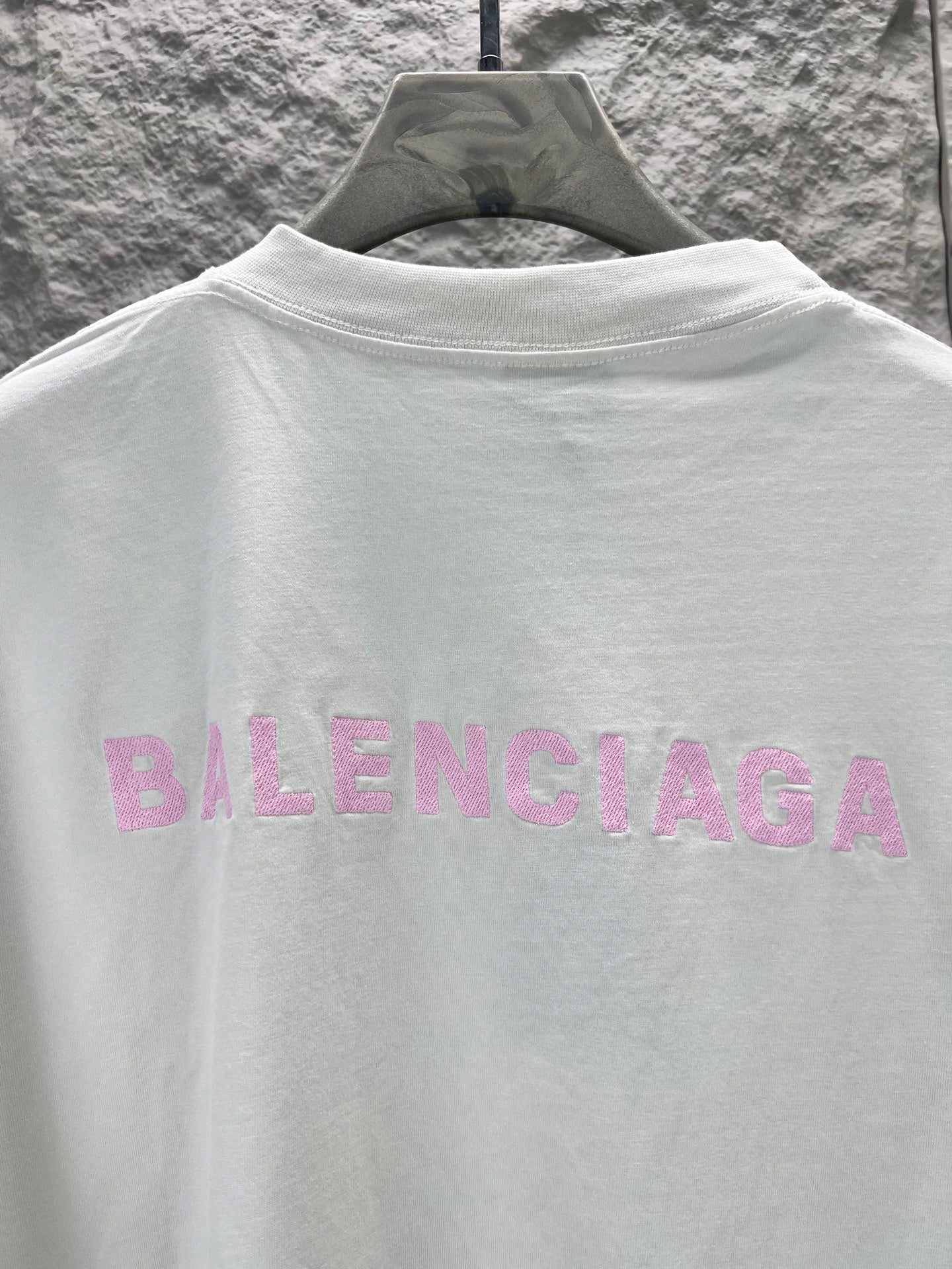 White T-shirt back with large pink BALENCIAGA lettering