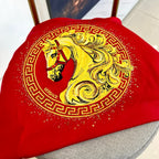 Versace red T-shirt chest graphic: gold Medusa in ornate border