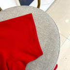 Versace red T-shirt sleeve and side hem detail