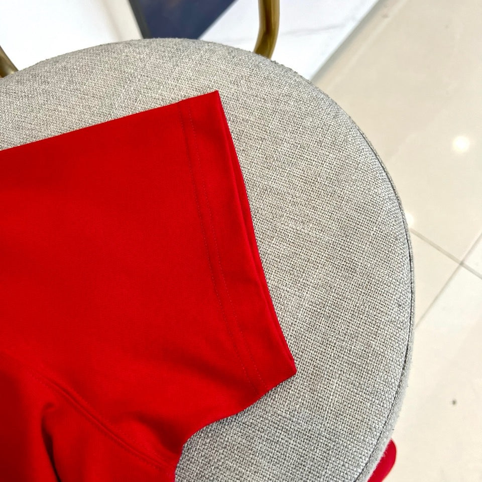 Versace red T-shirt sleeve and side hem detail