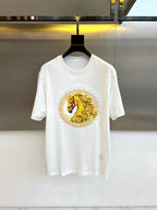 White T-shirt with gold horse crest and rhinestone border