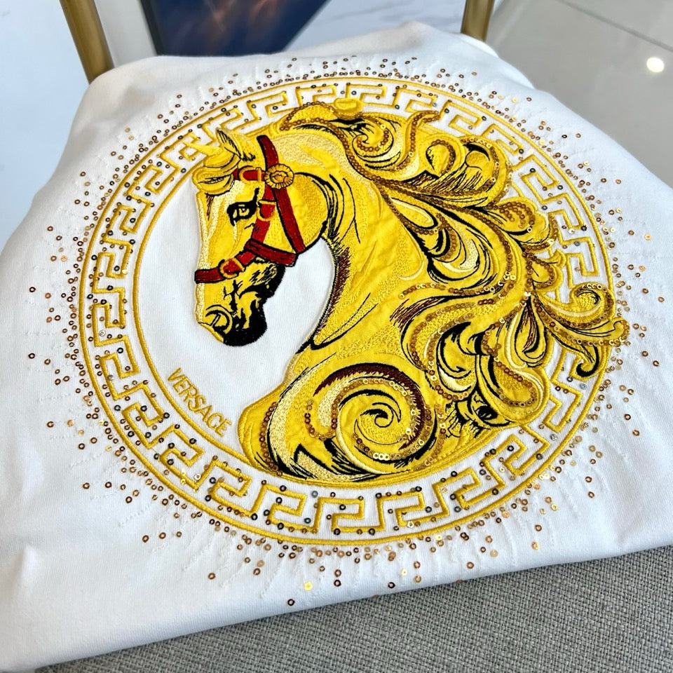 White T-shirt back with gold horse crest and rhinestone trim