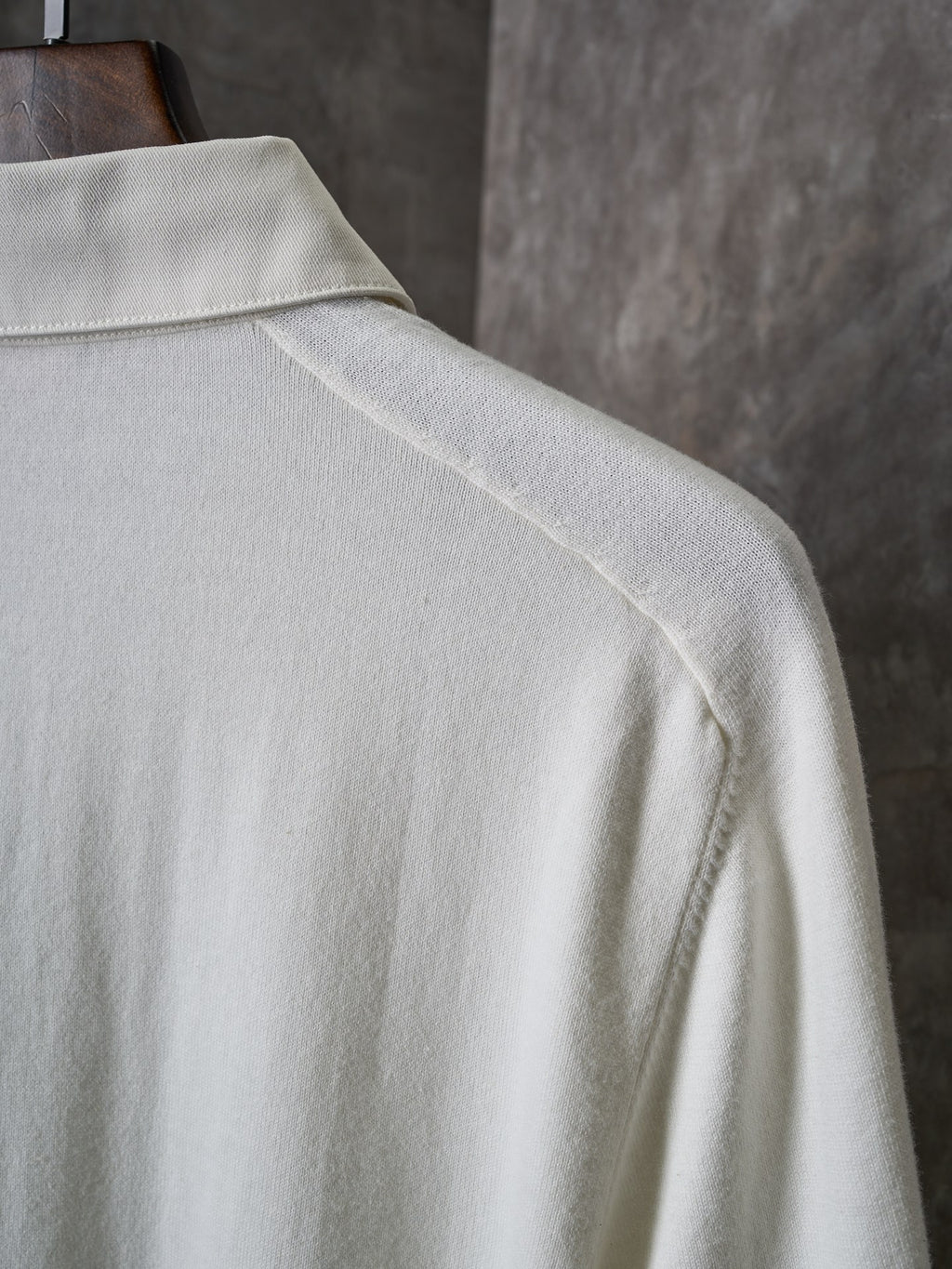 White polo shirt shoulder and collar close-up