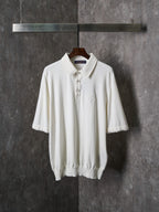 White polo shirt with button placket and short sleeves