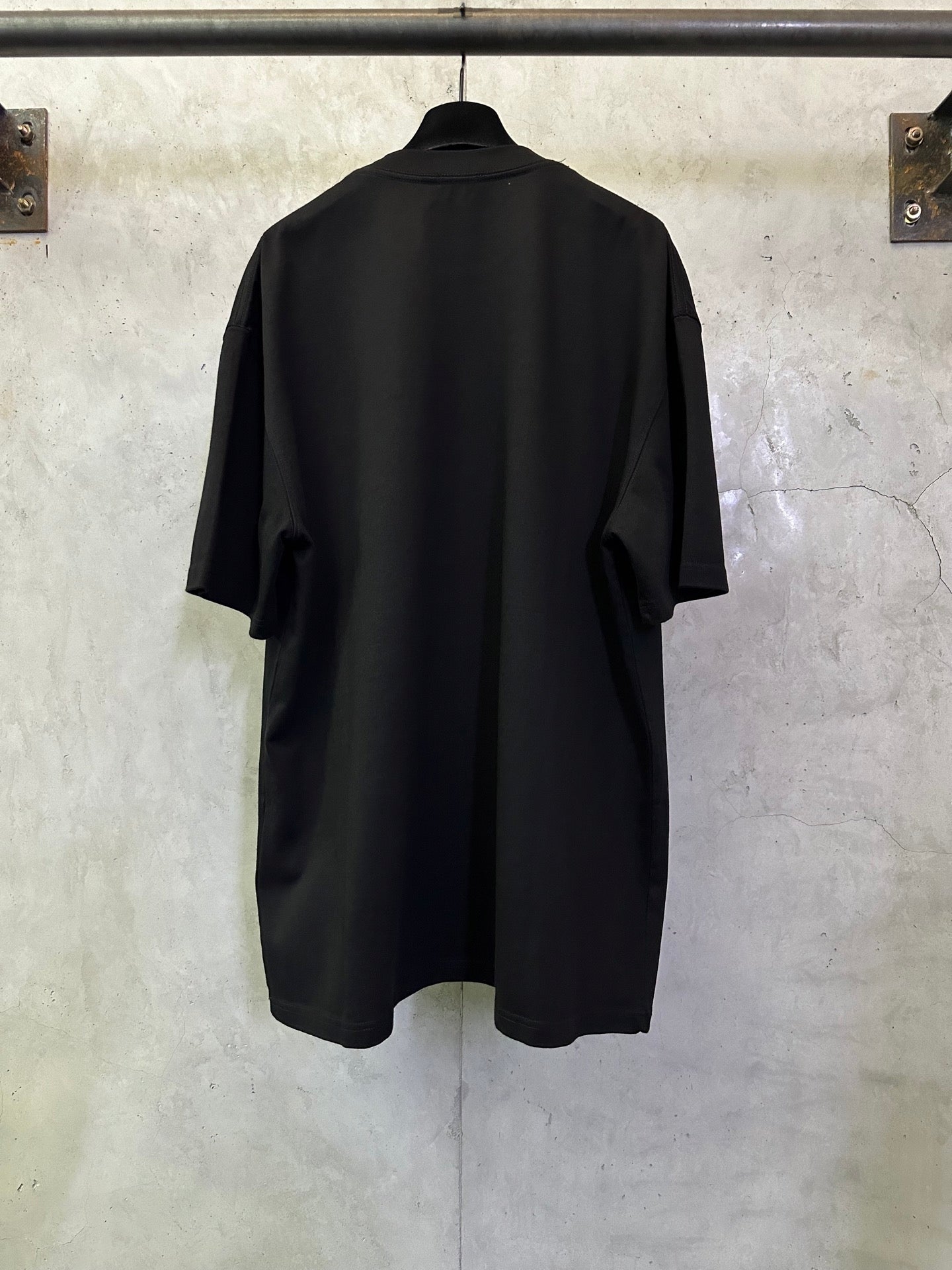Black Burberry T-shirt, back view on hanger