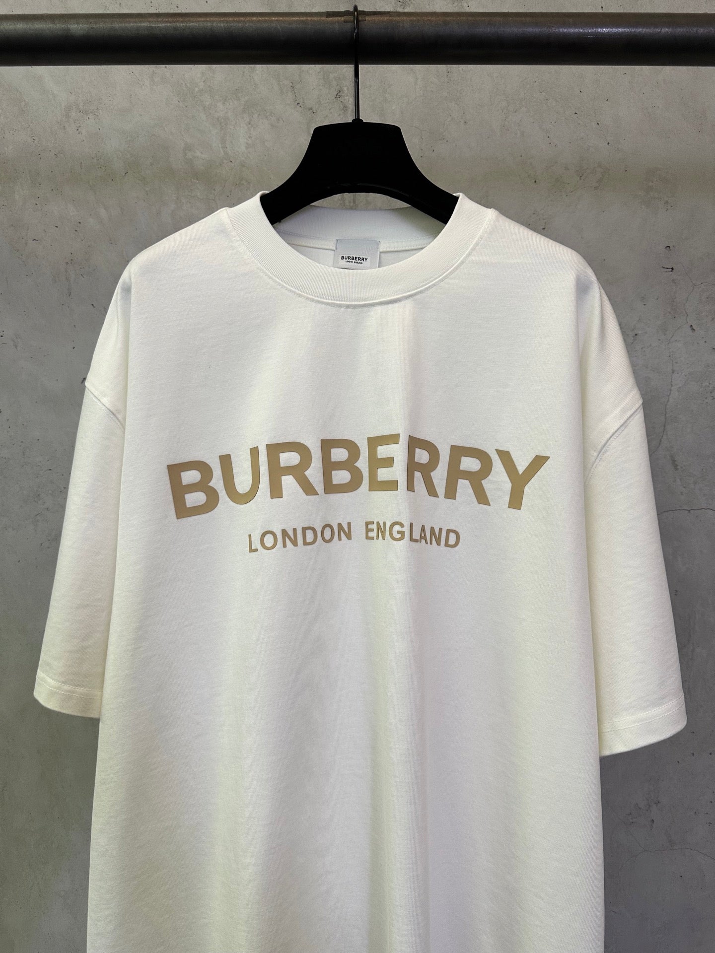Off-white crewneck T-shirt front with large Burberry logo and “London England”
