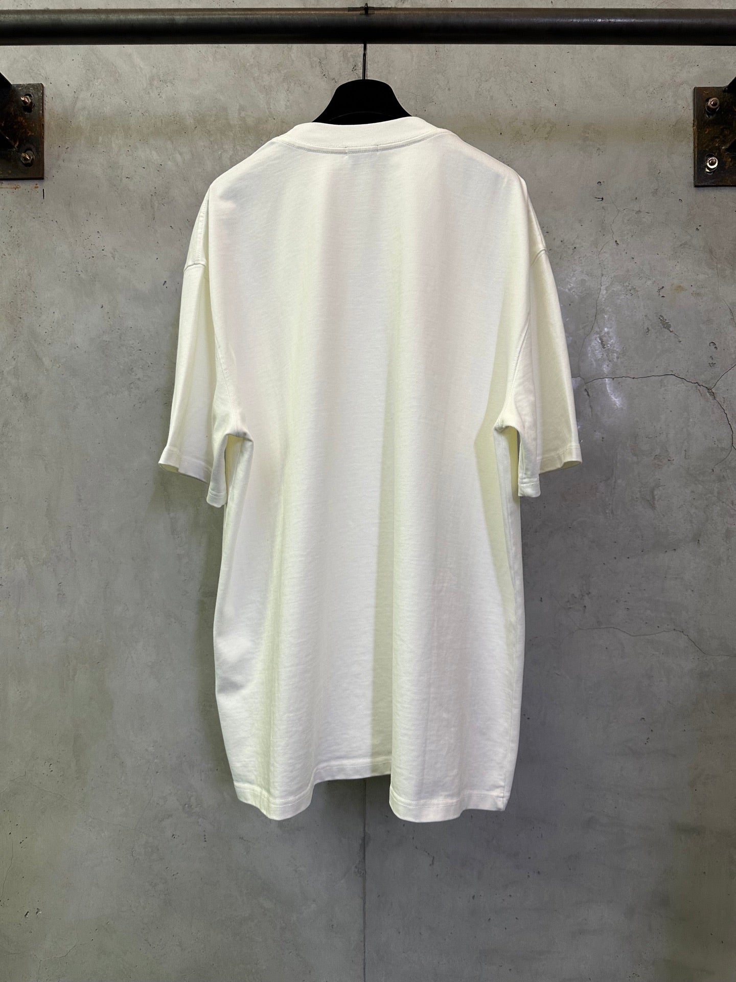 Off-white crewneck T-shirt, back view with short sleeves and relaxed fit