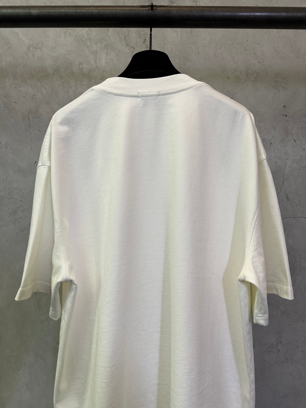 Off-white crewneck T-shirt, back view with wide short sleeves