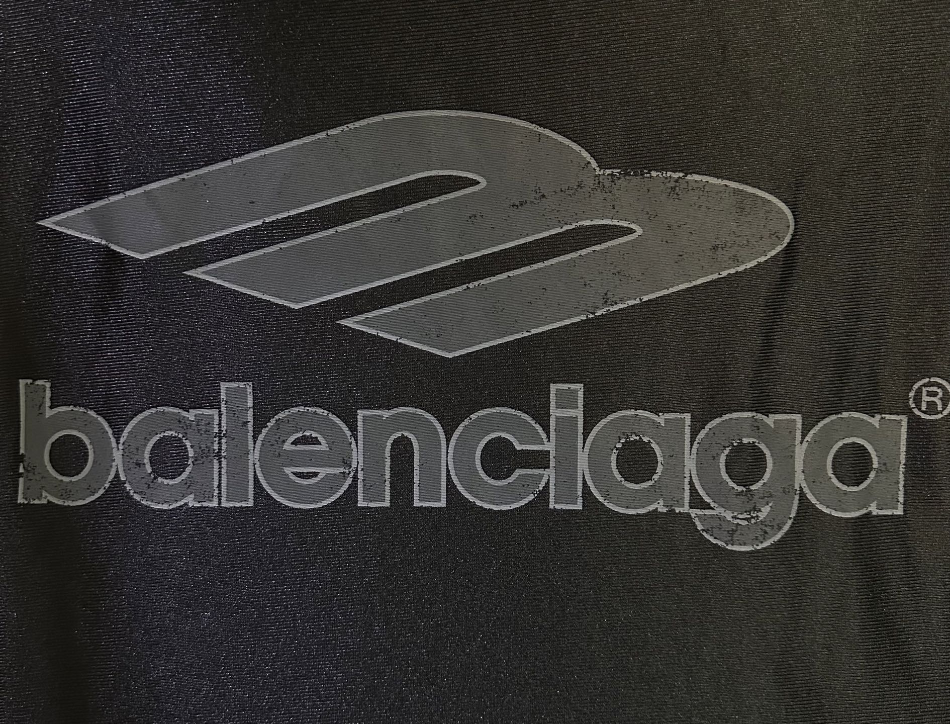 Balenciaga logo print on black long-sleeve shirt fabric