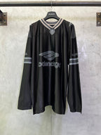 Balenciaga long-sleeve shirt in black with front logo and striped V-neck collar