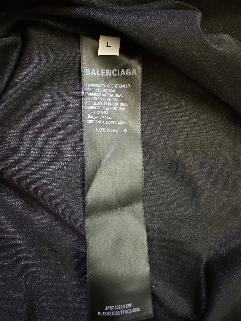 Balenciaga size L fabric label on black shirt interior