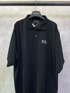 Balenciaga black polo shirt with embroidered chest logo and button placket