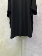 Balenciaga black polo shirt, back view with straight hem and draped short sleeves