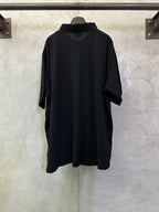 Balenciaga black polo shirt, back view, short sleeves and relaxed fit