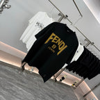 Black short-sleeve T-shirt angled view with yellow FENDI logo on chest