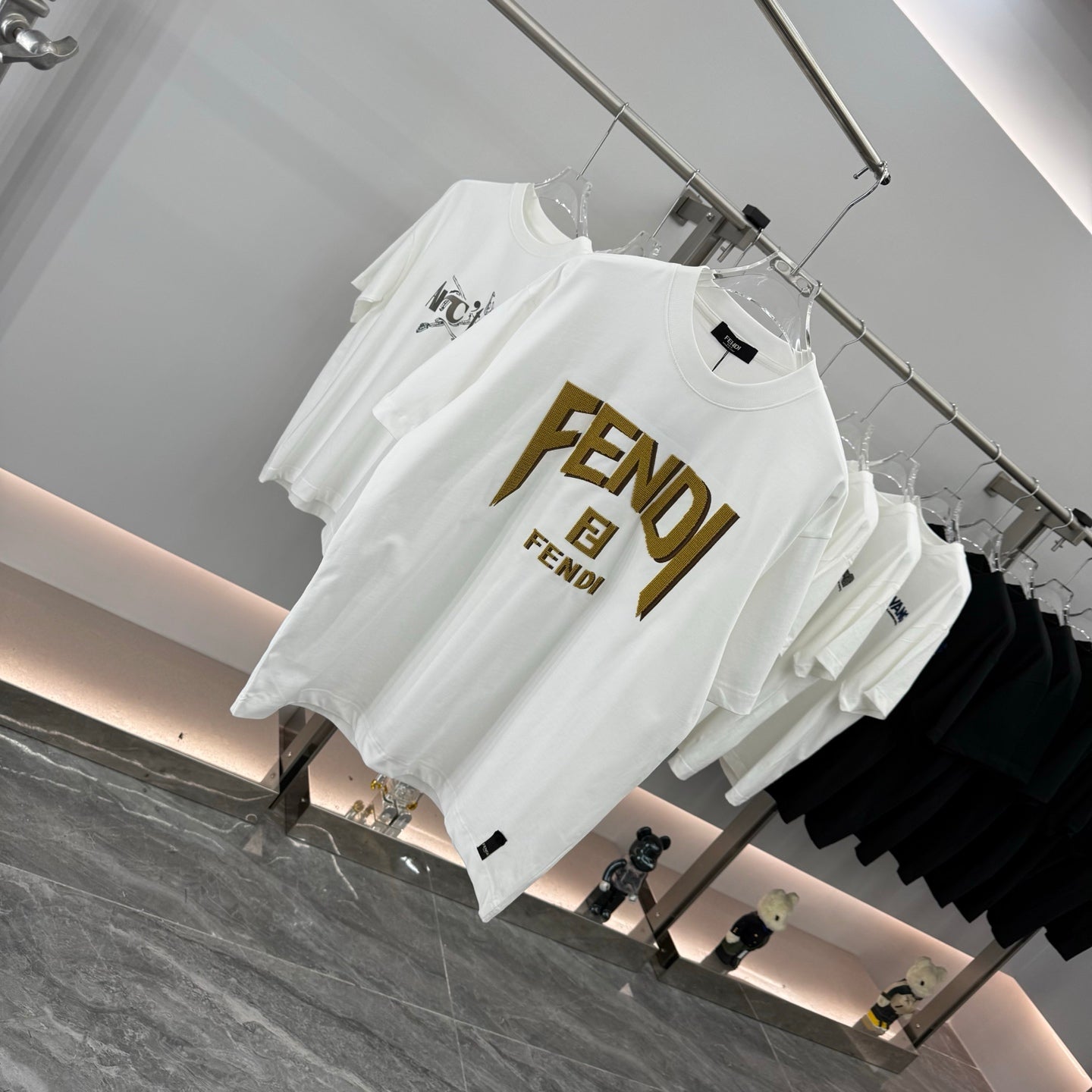 Fendi white short-sleeve T-shirt with large gold FENDI logo front