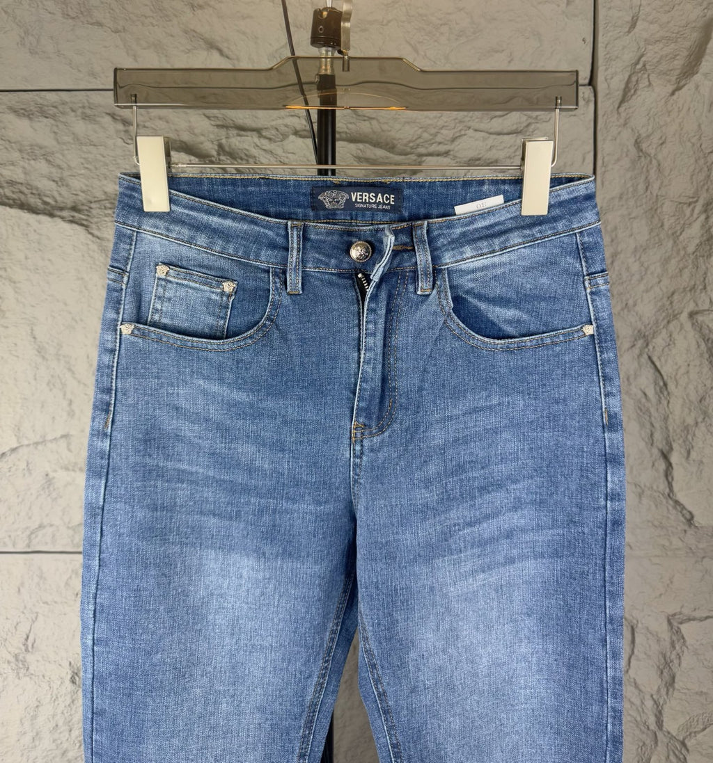 Versace medium blue denim jeans back view with two patch pockets and belt loops