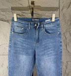 Versace medium blue denim jeans back view with two patch pockets and belt loops