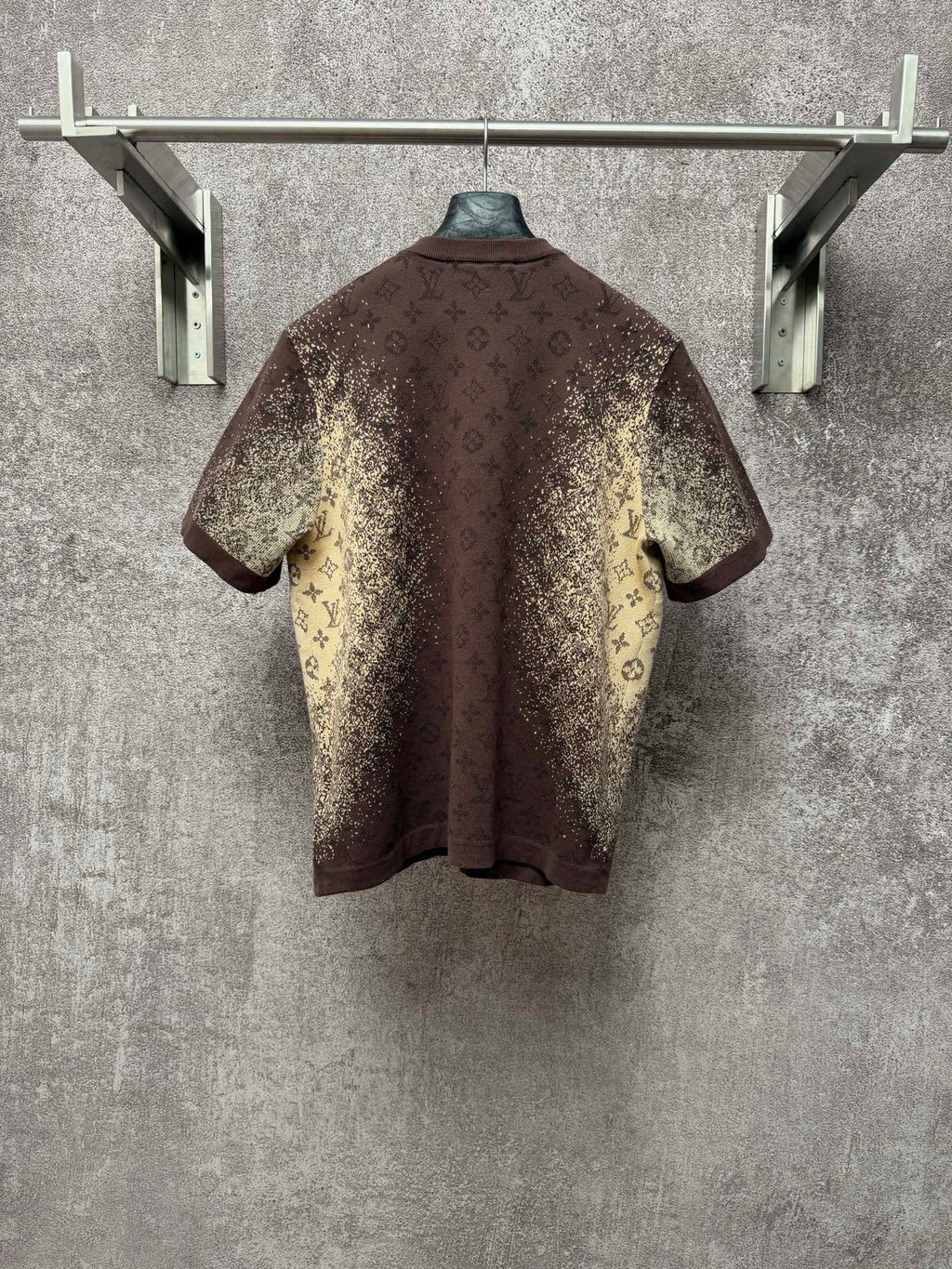 Short-sleeve T-shirt, dark brown with yellow monogram-style print, round back view