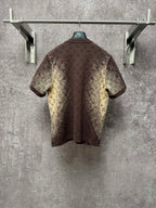 Short-sleeve T-shirt, dark brown with yellow monogram-style print, round back view