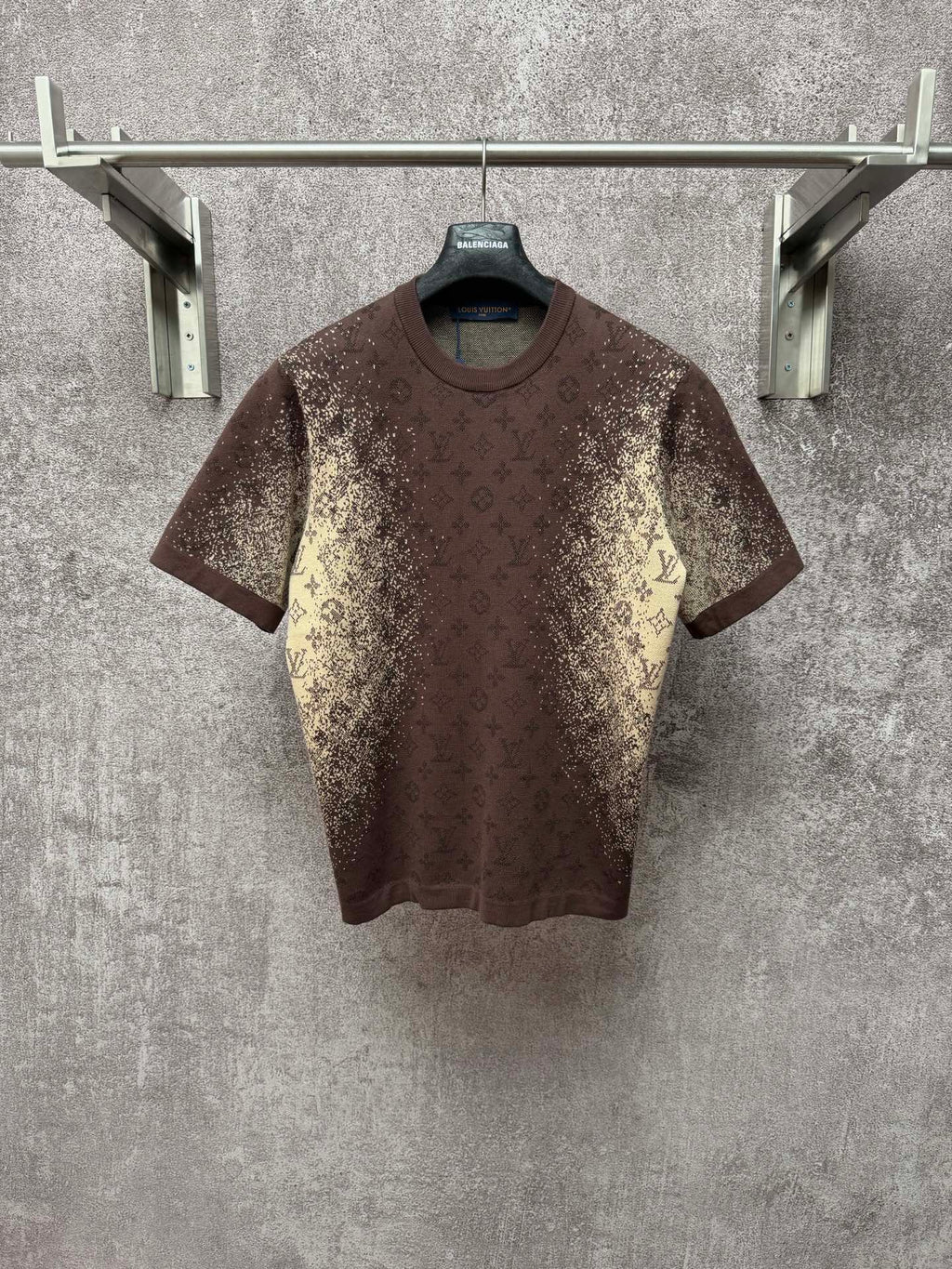 Short-sleeve T-shirt with dark brown base and yellow monogram-style print, crew neck