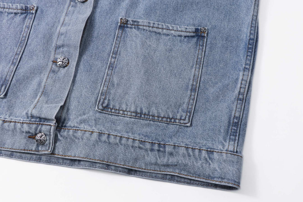 Denim jacket hem and pocket flap with decorative buttons