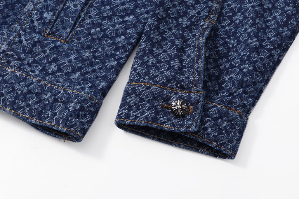 Dark blue patterned shirt cuff with decorative button and stitched seam