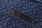 Dark blue patterned shirt interior label on button placket