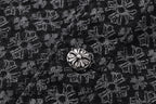 Dark patterned shirt with silver-tone floral button