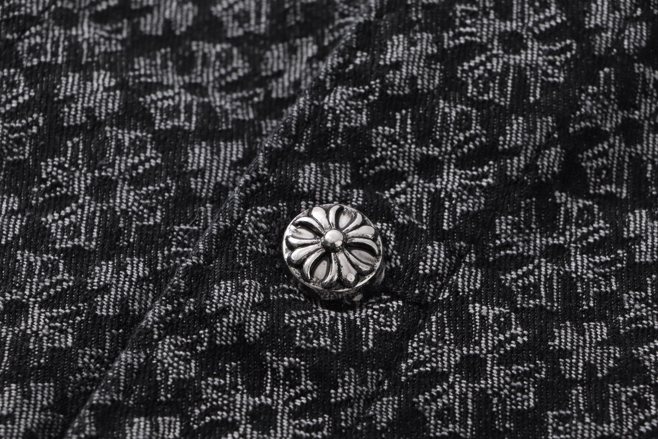 Dark patterned shirt with silver-tone floral button