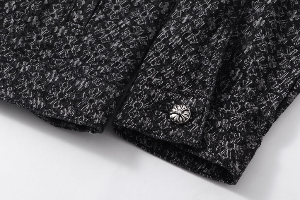 Dark patterned shirt cuff and decorative button detail