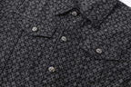 Dark patterned shirt front with small buttons along placket