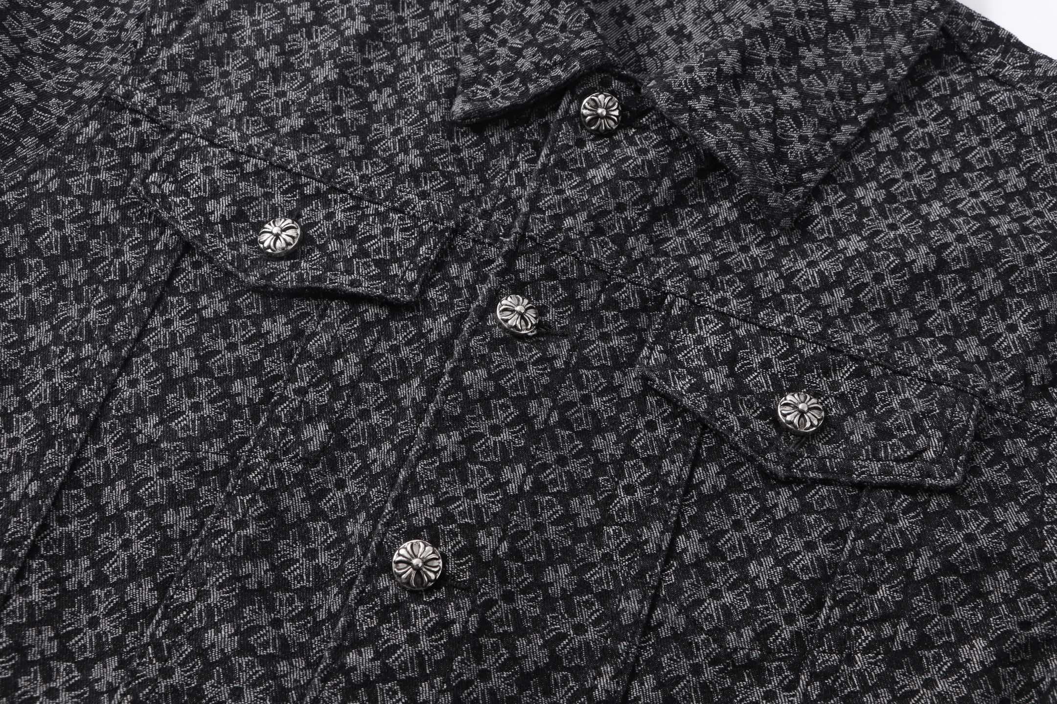 Dark patterned shirt front with small buttons along placket