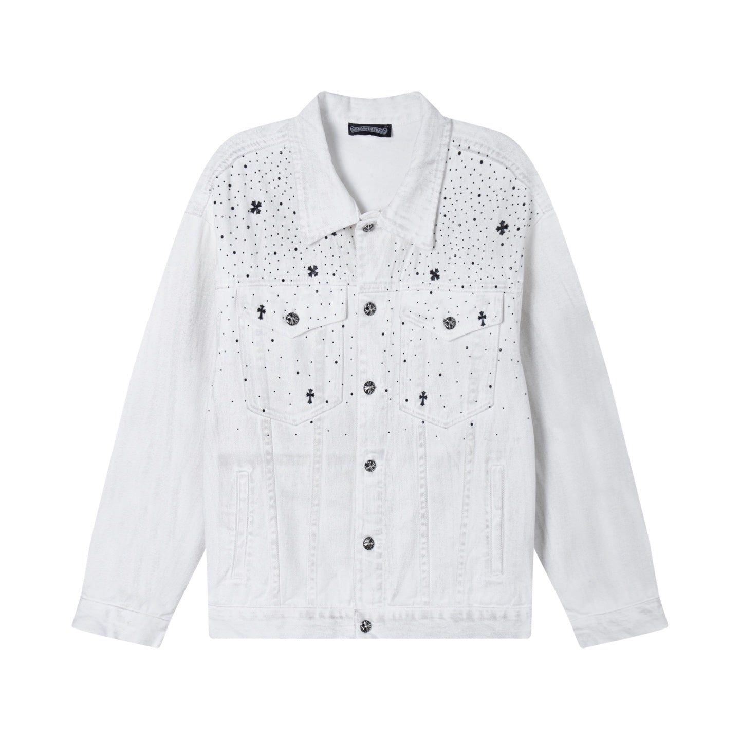 White denim jacket with button front and embroidered cross and dot pattern on shoulders