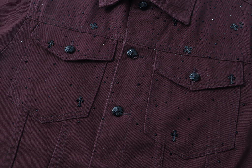 Chest pocket and button detail on dark plum long-sleeve jacket