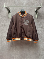 Louis Vuitton long bomber jacket in dark plum with striped ribbed collar and cuffs