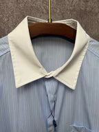Light blue pinstripe shirt with cream point collar and draped neck tie
