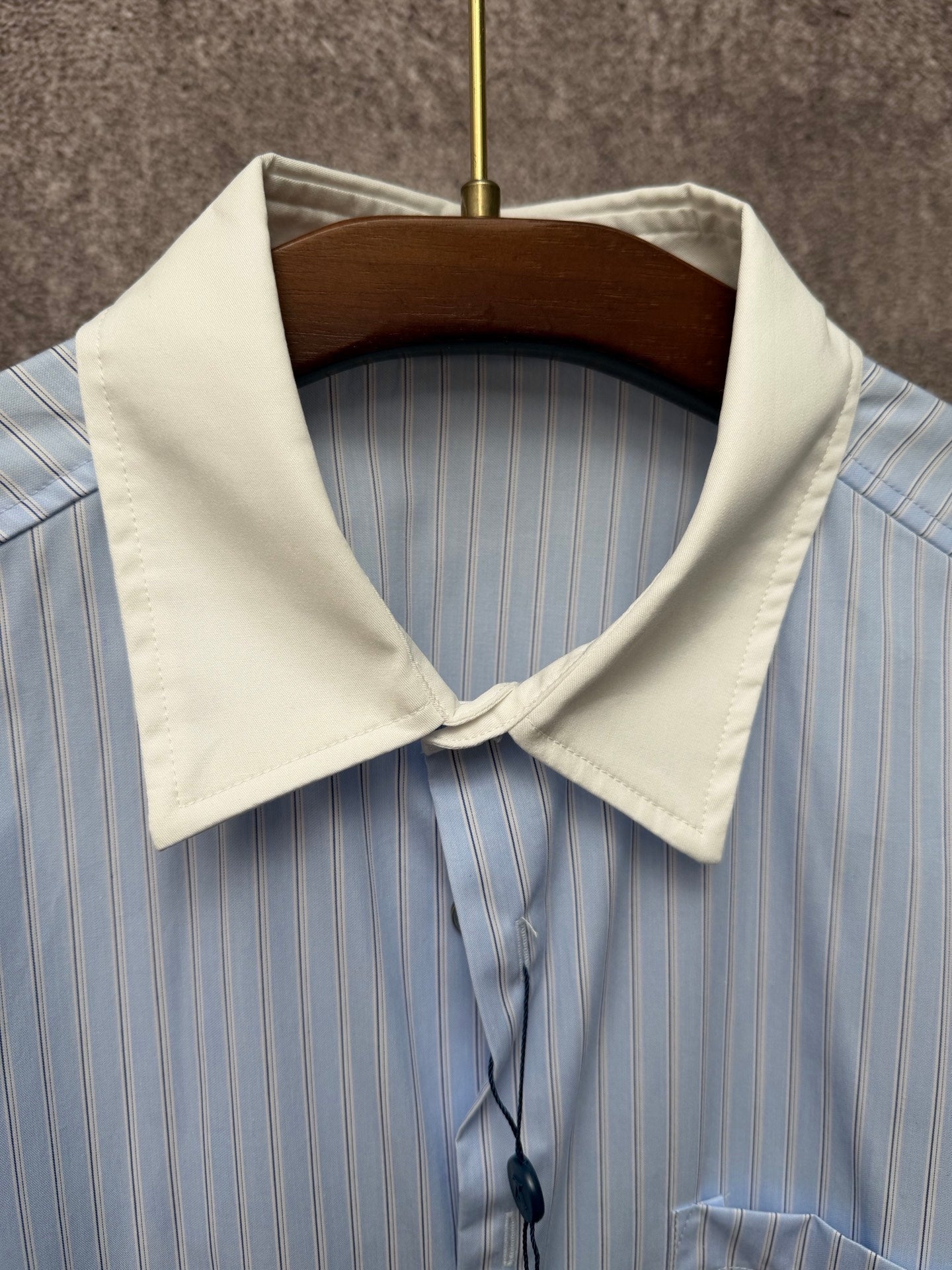 Light blue pinstripe shirt with cream point collar and draped neck tie