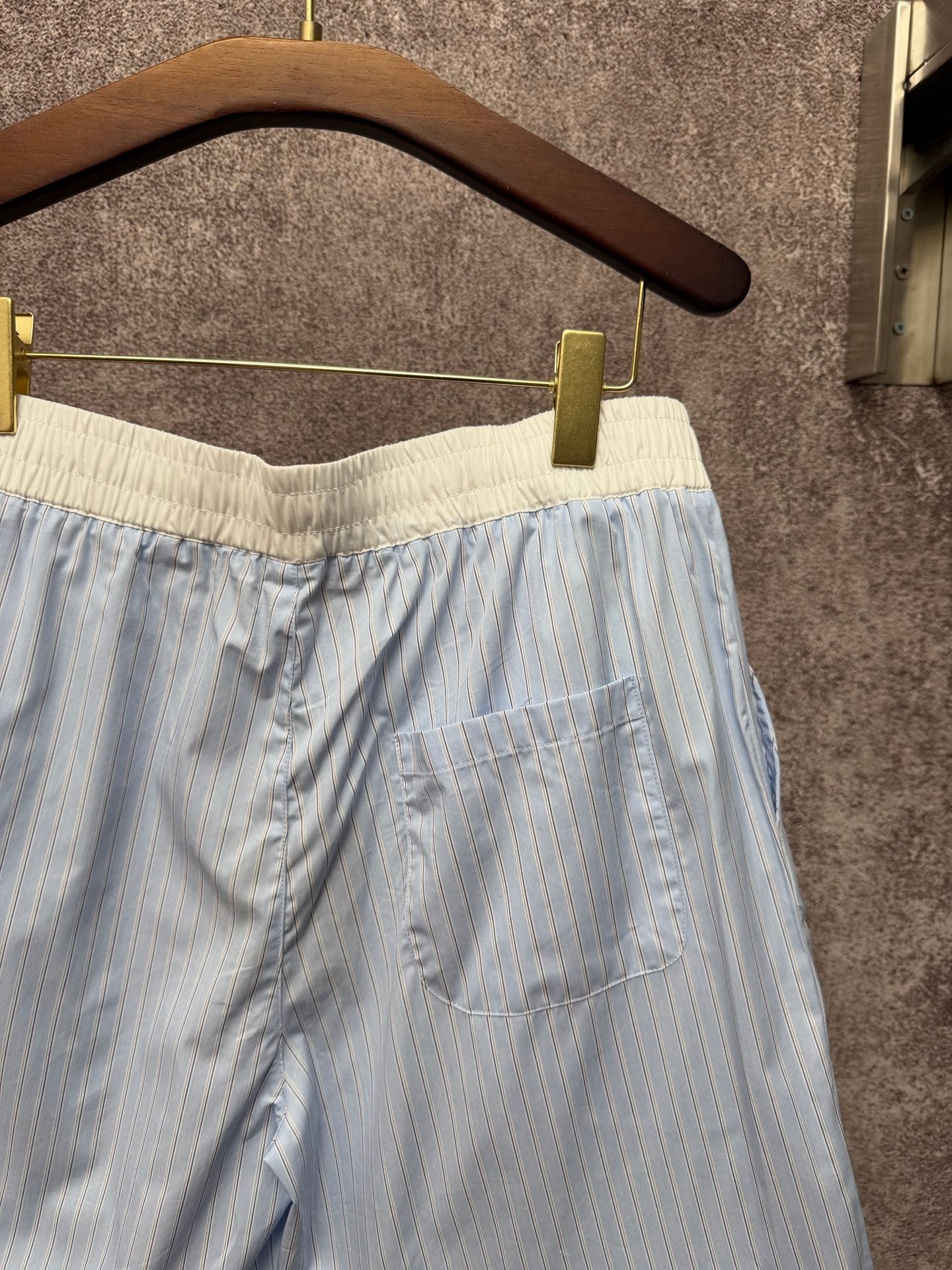 Light blue pinstripe shorts with side pocket and elastic waistband, Louis Vuitton